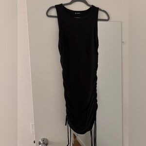 Women’s dress (ties to go longer or shorter); size small
